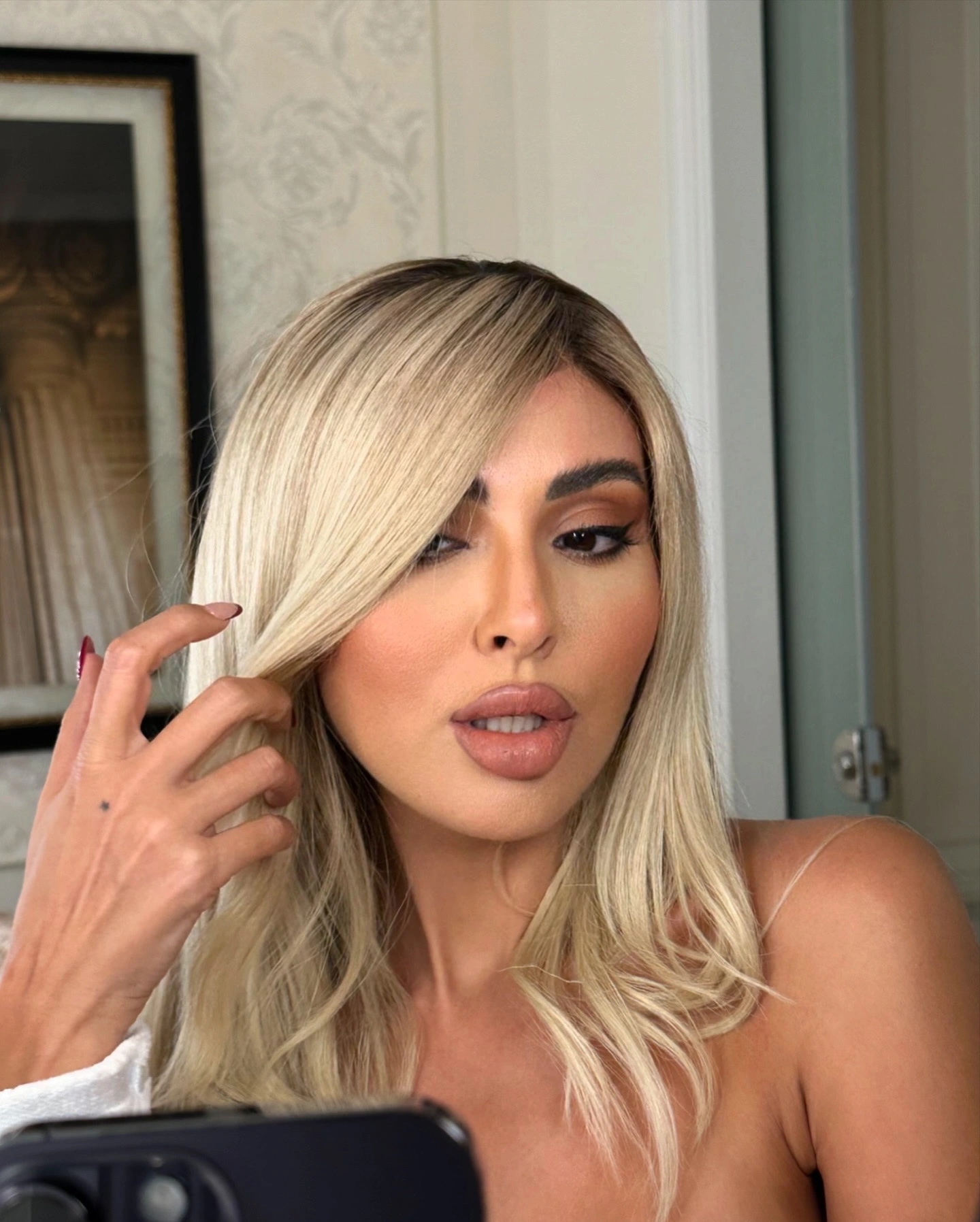 Mendy Beaut sleek straight platinum blonde wig displayed on wig stand – perfect for everyday glam or bold looks